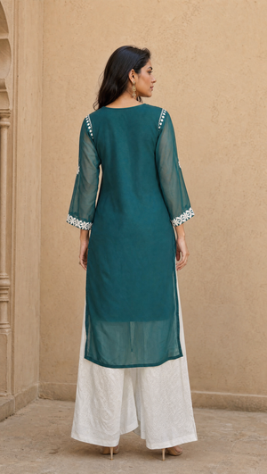 White rayon cotton palazzo paired with teal green chikankari georgette kurta