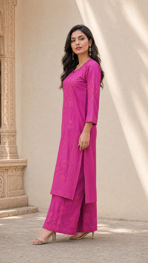Rani Pink chikankari kurta with 3/4 sleeves and embroidered border