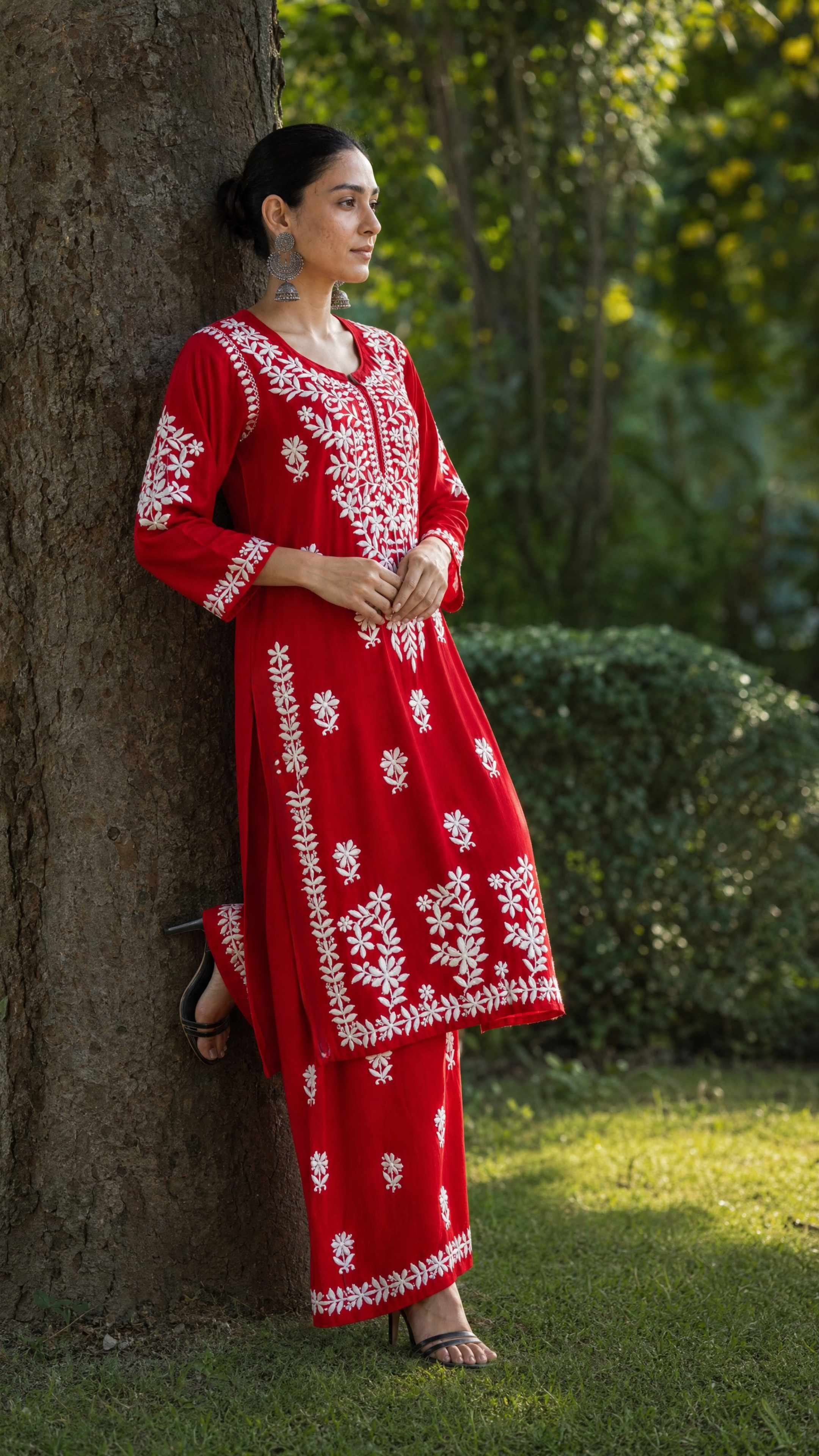 Red chikankari kurta with 3/4 sleeves and embroidered border