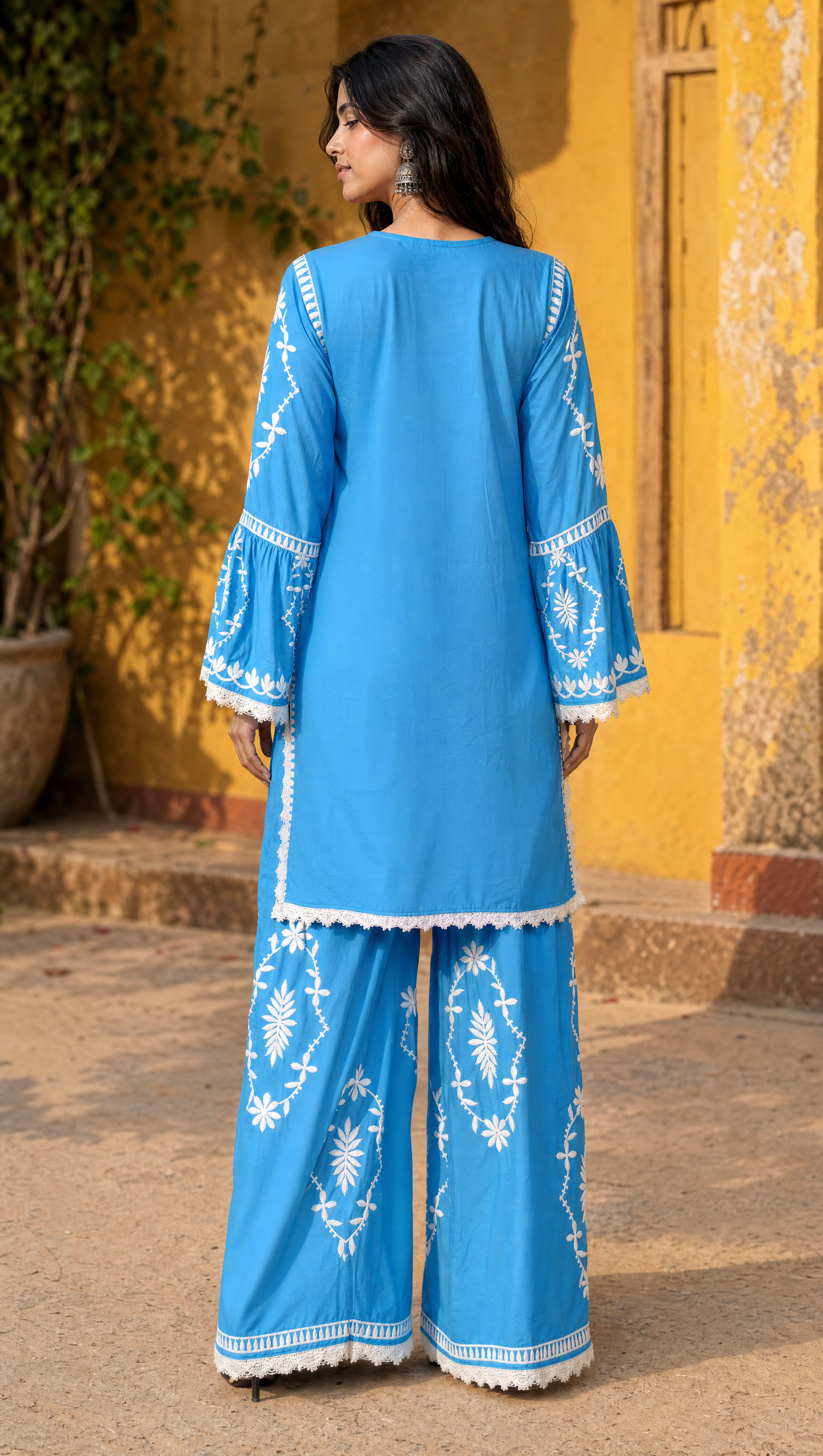 Sky blue rayon cotton embroidered palazzo with lace border and floral chikankari work