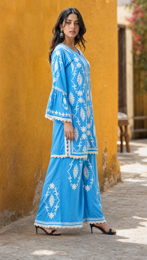Sky blue chikankari kurta with 3/4 bell sleeves and lace detailing