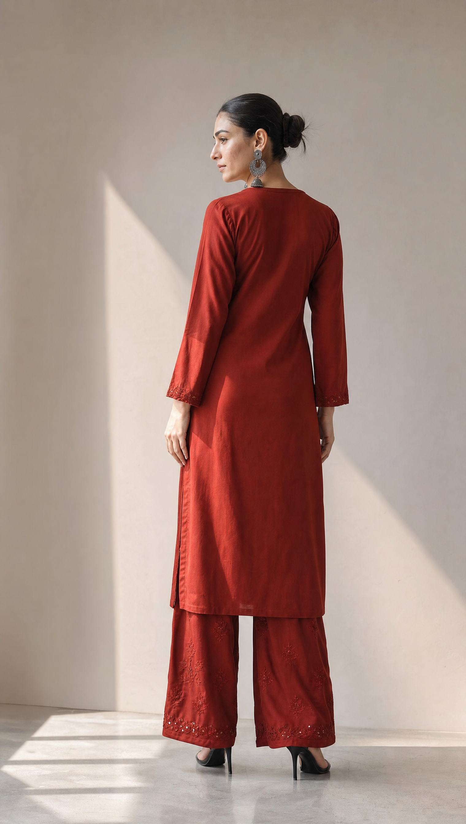 Brown chikankari kurta with 3/4 sleeves and embroidered neckline