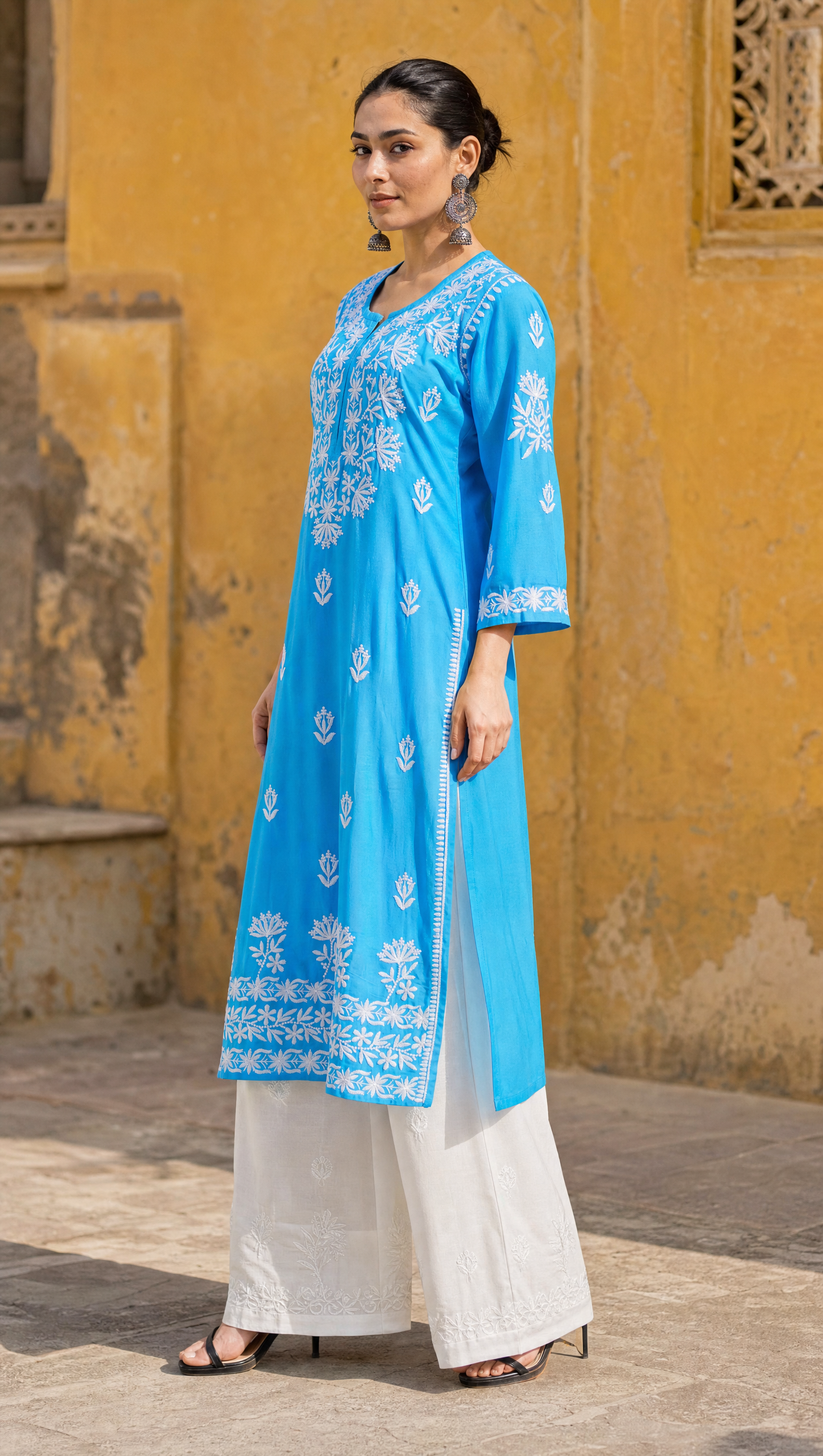 Sky blue chikankari kurta with floral embroidery and 3/4 sleeves